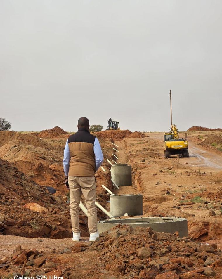 Engineers on site at a services installation